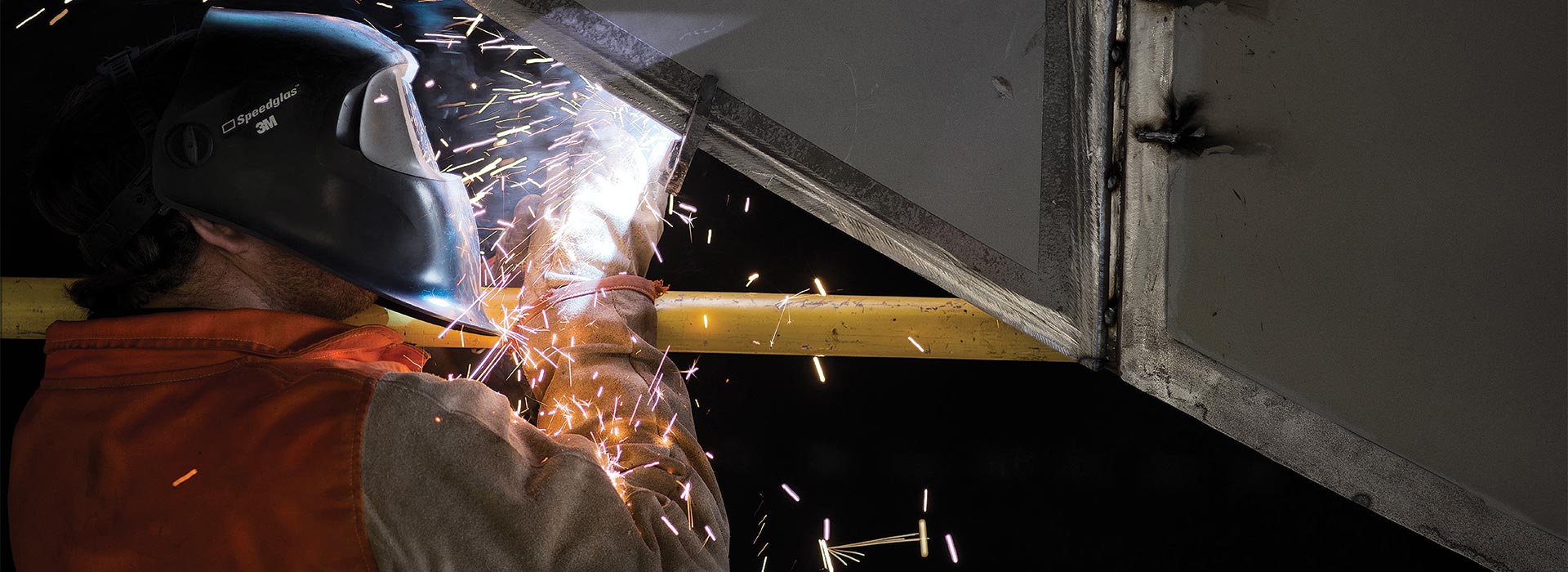 Defence Career options - skilled welder working on a steel component