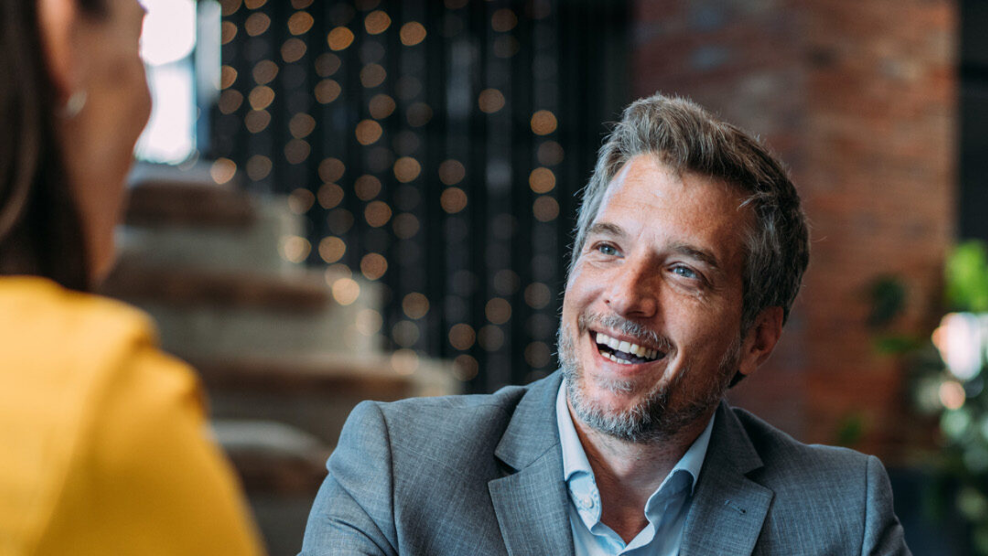Veterans SA Career Connections event - A middle aged businessman smiles to someone off camera