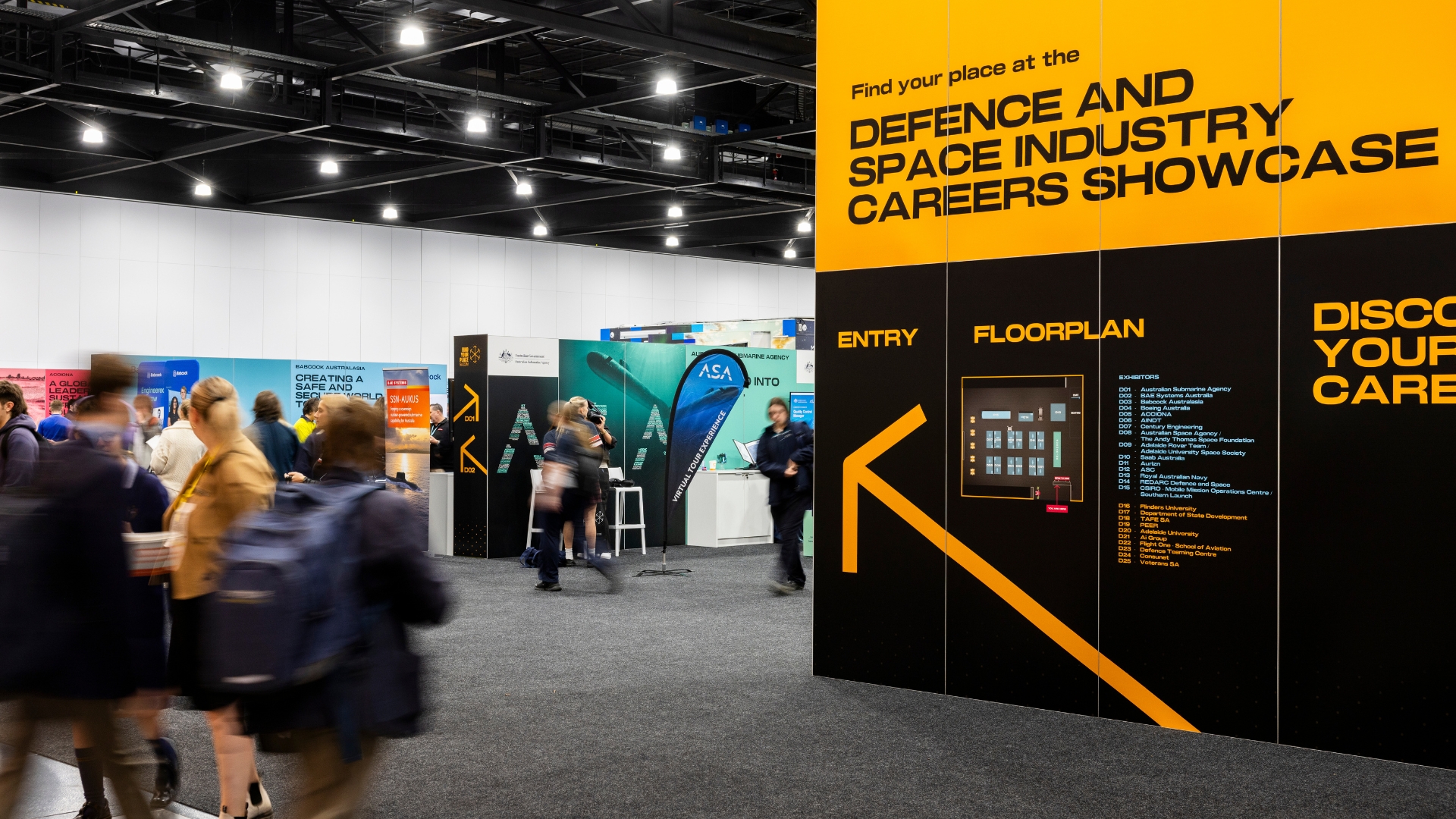 People walking into the Defence and Space Industry Showcase
